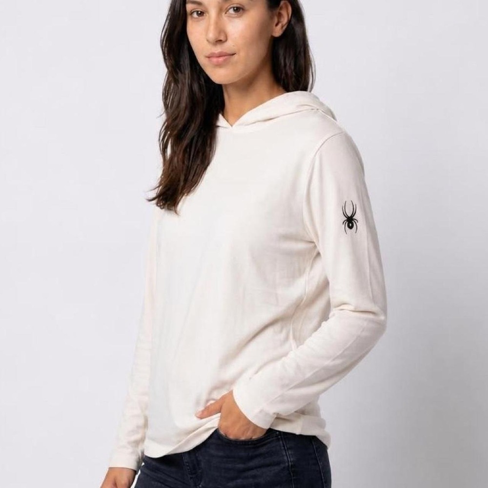 White long sleeve hoodie with black spider logo on the sleeve